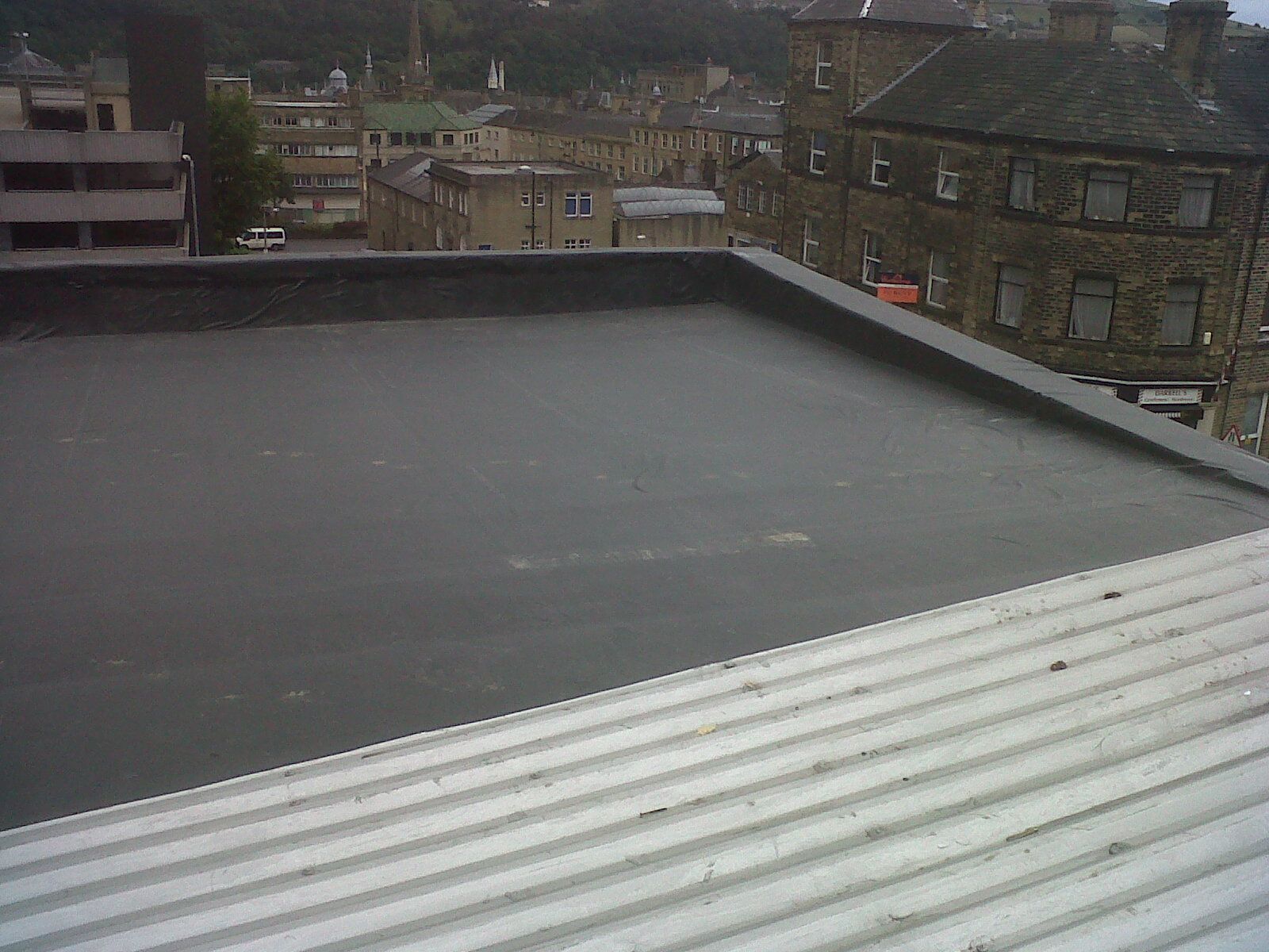 A rubber (EPDM) flat roof on a city building